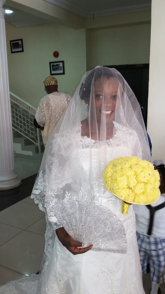 Awwwww....beautiful...the gown...the smile...the bouquet...and the babe herself...